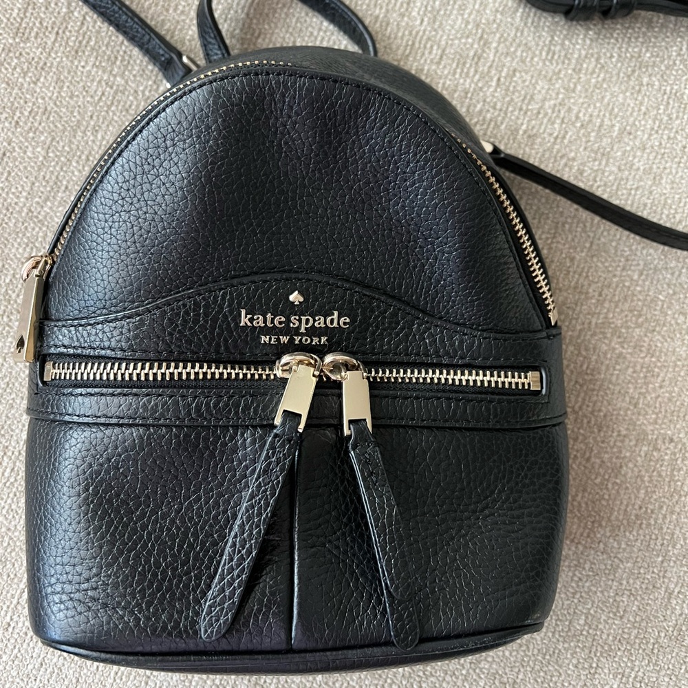Kate, spade, Crossbody, or you can change it to a backpack